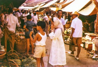 People shopping at vegetable stalls at the old market, Johor Bahru, Johor, Malaya, Malaysia, south