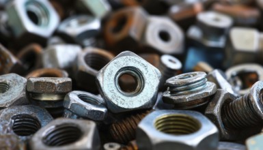 Fasteners And Hardware On A Simple Surface - Discover The World Of Nuts And Bolts On A Plain, With