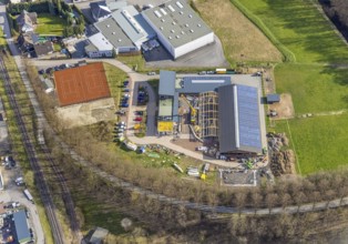 Aerial view, construction site and new building veterinary practice for horses and small animals in