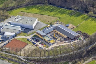 Aerial view, construction site and new building veterinary practice for horses and small animals in
