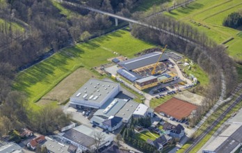 Aerial view, construction site and new building veterinary practice for horses and small animals in