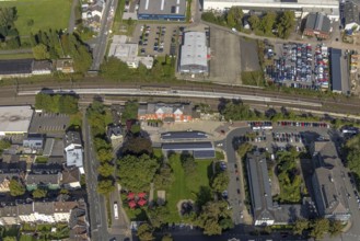 Aerial view, Schwelm railway station with red station building and bus station with solar roof and