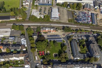 Aerial view, Schwelm railway station with red station building and bus station with solar roof and