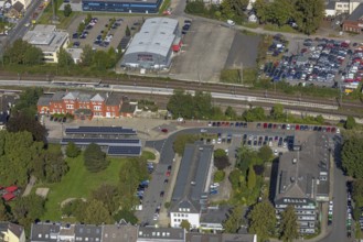 Aerial view, Schwelm railway station with red station building and bus station with solar roof and