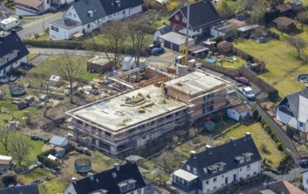 Aerial view, construction site and new building of the Protestant Kindergarten Schießberg,