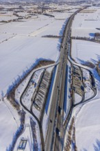 Aerial photo, Ostönner Grund rest area on the A44 motorway, snow, winter, rest areas, trucks,