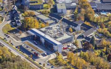 Aerial view, bus station and construction work at the vocational college Olsberg of the HSK in