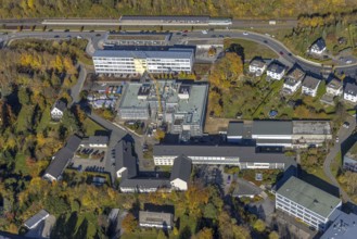 Aerial view, bus station and construction work at the vocational college Olsberg of the HSK in