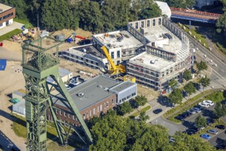 Aerial view, winding tower and Steigerhaus as well as construction site and new building at