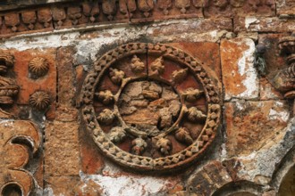 Intricate circular stone design in ancient architecture with detailed carvings-Dhaka, Bangladesh