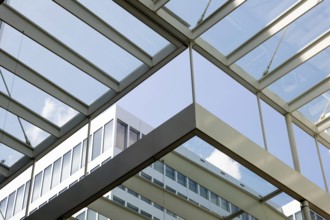 Modern Office Building in Zurich Airport in a Sunny Summer Day with Blue Sky and Clouds in the