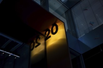 Illuminated Street Sign Number Twenty on Modern Building in Zurich, Zurich canton, Switzerland
