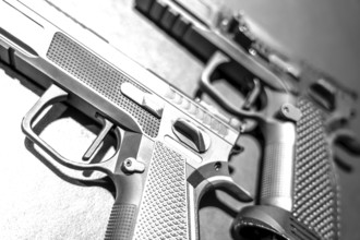 Modern Elegant Sport Handgun For IPSC and IPDA on Grey Background in Switzerland