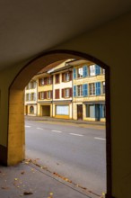 Arch View over the City Street with House in an Autumn Day in City of Nidau, Bern Canton,