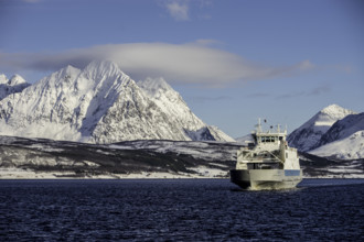 Snow ship bay mountains boat norway tromsø sea