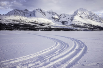 Norway tromsö snow mountains lake frozen