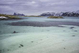 Norway tromsö snow mountains sea turquoise