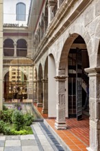 Architectural interplay of historical style with a modern touch in the inner courtyard, San