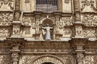 Detailed façade with religious sculpture and elaborate baroque style, San Fransisco Cathedral in La