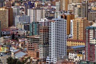 Close-up of skyscrapers and colourful buildings in a city, The houses and skyscrapers of downtown