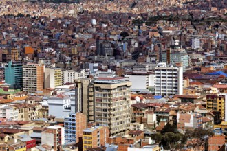 View of a city with many buildings in densely populated surroundings, The houses and skyscrapers of