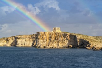 Amazing view of rainbow after the rain above Comino island, Malta