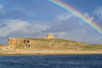 Amazing view of rainbow after the rain above Comino island, Malta