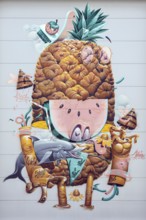 Humorous depiction of a pineapple with anthropomorphic features, at the port of Linz Upper Austria