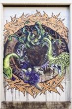 Mythical motif with Medusa and several snakes in a circular design, at Linz harbour Upper Austria