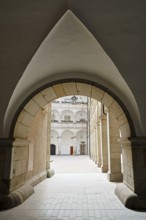 Arched passageway to an inner courtyard in a historic stone building, Arkardenhof Landhaus Linz