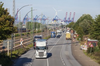 Road with lorries and container terminal in the port of Hamburg, Veddel, Hamburg, Germany