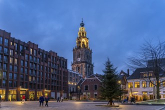 New Market and the Martinitoren church tower or Martinikerk church tower at dusk, Groningen,