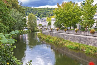 Promenade and arcade footbridge on the Franconian Saale in Bad Kissingen, Bavaria, Germany