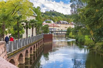 Promenade and arcade footbridge on the Franconian Saale in Bad Kissingen, Bavaria, Germany