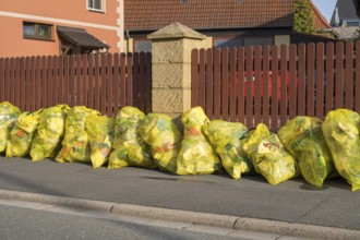 Yellow bags for plastic waste at the roadside, waste separation, Bad Staffelstein, Upper Franconia,