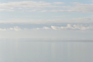 North Sea coast, special light atmosphere over the Wadden Sea with rising water and calm wind,