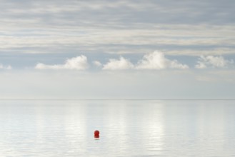 North Sea coast, special light atmosphere over the Wadden Sea with rising water and calm wind, red