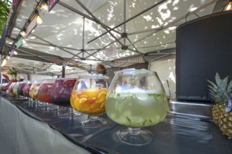 Large glasses filled with punch, market stall at the city festival, Nuremberg, Middle Franconia,