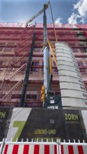 Construction crane at a house renovation, Nuremberg, Middle Franconia, Bavaria, Germany