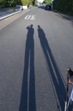 Silhouette of an old couple on a walk, Bavaria, Germany