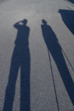 Silhouette of an old couple on a walk, Bavaria, Germany