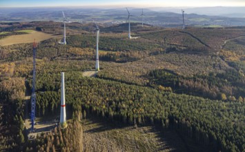 Aerial photo, wind turbines and construction site for a new wind turbine in the Riesenhagen forest