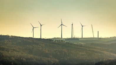 Aerial photo, wind turbines and construction site for a new wind turbine in the Riesenhagen forest