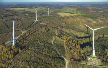 Aerial photo, wind turbines and construction site for a new wind turbine in the Riesenhagen forest