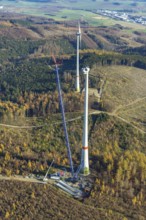 Aerial photo, wind turbines and construction site for a new wind turbine in the Riesenhagen forest