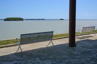 Two benches with a view of the sea and distant islands against a clear sky, Flamingo, Everglades