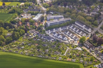 Aerial view, airport housing estate, building site and new building housing estate