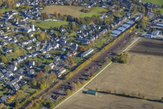 Aerial view, sawmill timber yard at the railway embankment in the district Wennemen in Meschede,