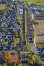 Aerial view, sawmill timber yard at the railway embankment in the district Wennemen in Meschede,