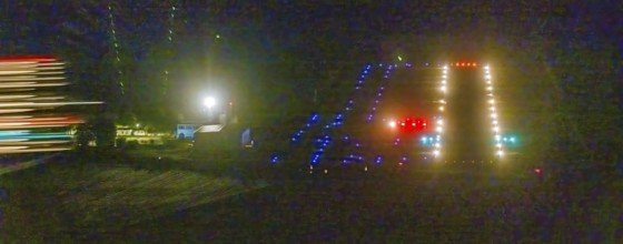 Aerial photo, Marl Loemühle airfield, night approach to the runway with PAPI, runway lighting,